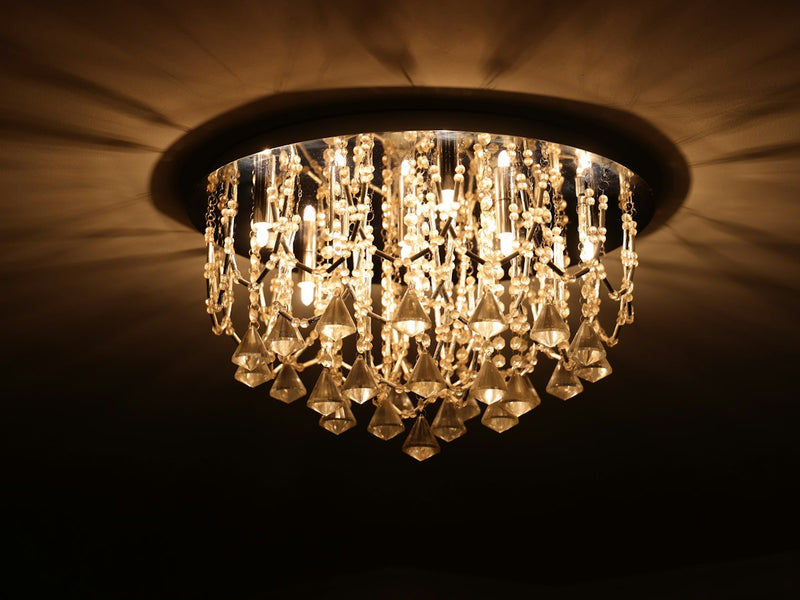 Crystal flush mount ceiling light glowing warm