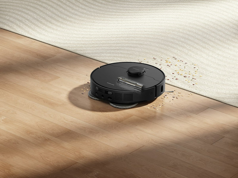 Robot vacuum on a wood floor